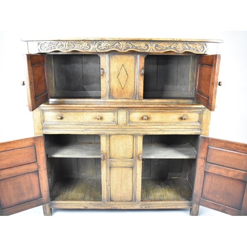 487 - A Nice Quality Oak Court Cupboard with Two Drawers to Base, Raised Top Section with Inlaid Panel Doo... 