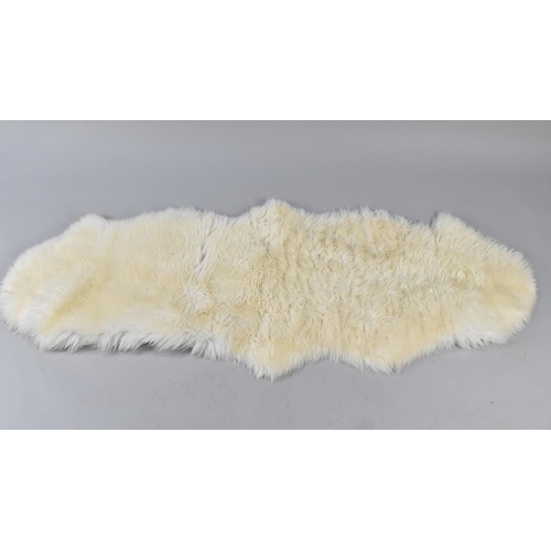 491 - A Sheepskin Rug, Approx 170x66cm