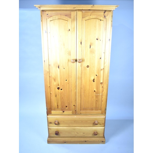 498 - A Modern Pine Wardrobe with Two Base Drawers, 87cms Wide