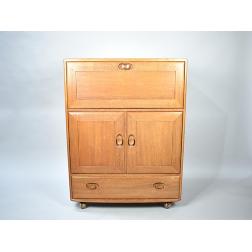 499 - An Ercol Side Cabinet with Pull Down Front, Cupboard Centre, Long Drawer to Base together with Three... 