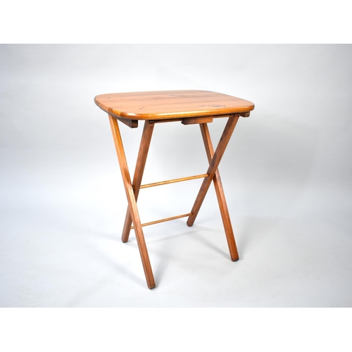 511 - A Modern Stained Pine Folding Table, 54cms Wide