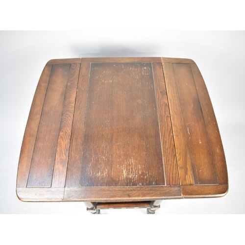 520 - A Mid 20th Century Oak Two Tier Drop Leaf Trolley, 67cms Wide