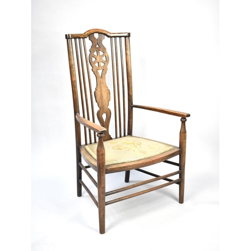 540 - An Edwardian Spindle Wheel Back Ladies Nursing Armchair