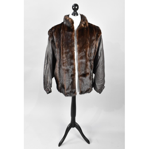 543 - A Modern Leather and Fur Ladies Jacket