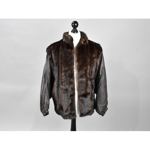 543 - A Modern Leather and Fur Ladies Jacket