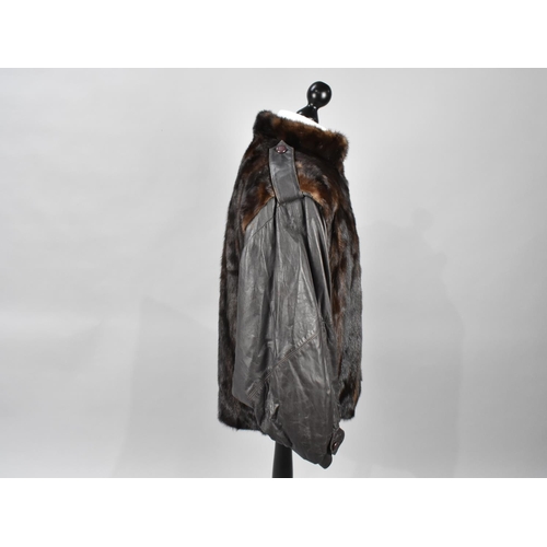 543 - A Modern Leather and Fur Ladies Jacket