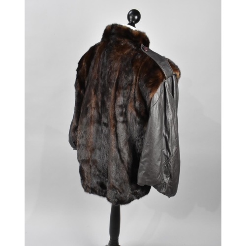 543 - A Modern Leather and Fur Ladies Jacket