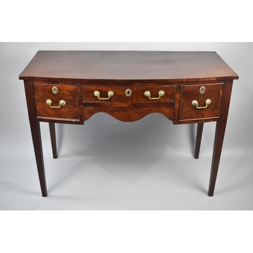 72 - A 19th Century Mahogany Bow Fronted Side Table with Centre Long Drawer Flanked by Two Deeper Drawers... 