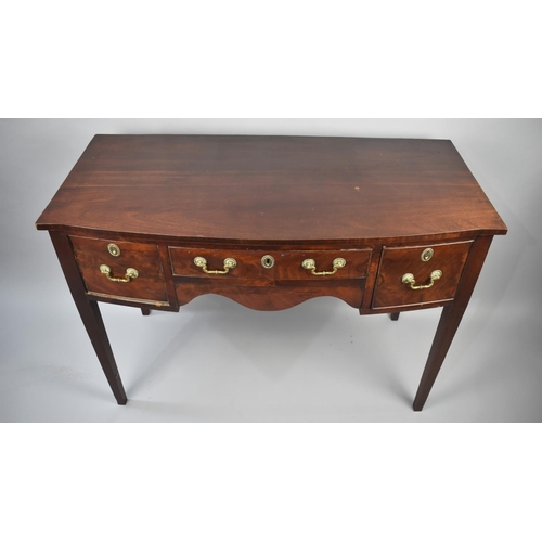 72 - A 19th Century Mahogany Bow Fronted Side Table with Centre Long Drawer Flanked by Two Deeper Drawers... 