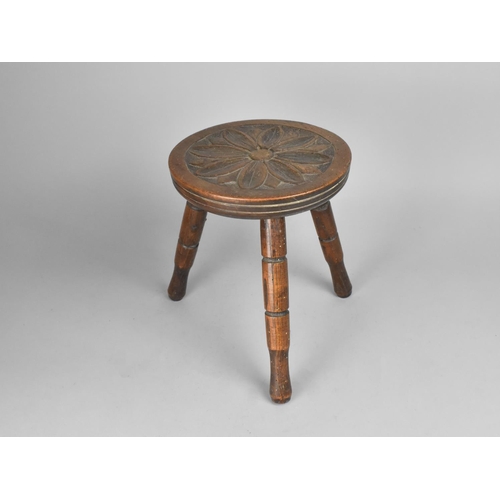 75 - A Mid 20th Century Carved Circular Three Legged Stool, 21cms Diameter