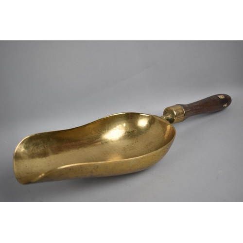 99 - A Vintage Wooden Handled Brass Scoop, 42cms Long