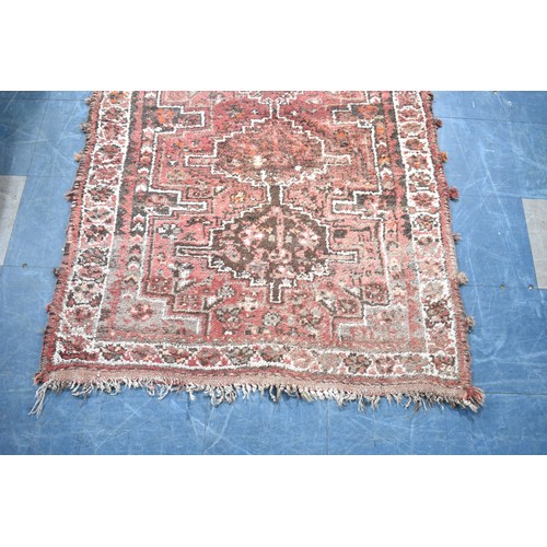 525 - A Patterned Woolen Rug, Somewhat Worn, 157x114cms