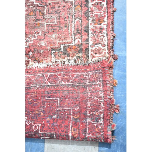 525 - A Patterned Woolen Rug, Somewhat Worn, 157x114cms