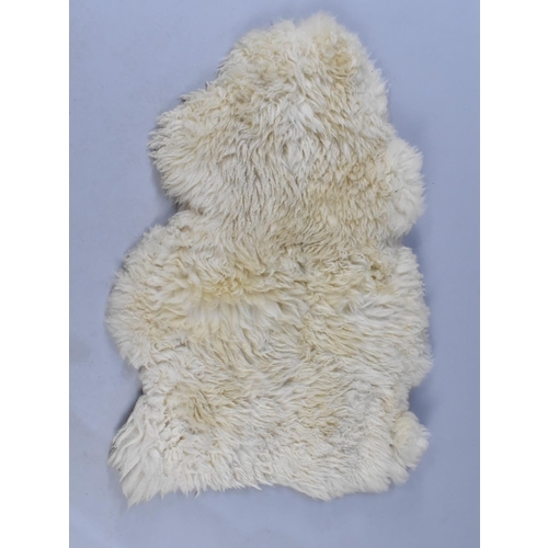 488 - A Sheepskin Rug, Approx 100x67cms