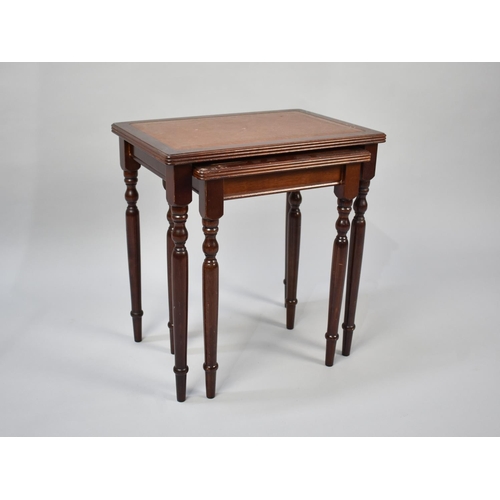 115 - A Nest of Two Tooled Leather Topped Table, Late 20th Century, 34cms Wide