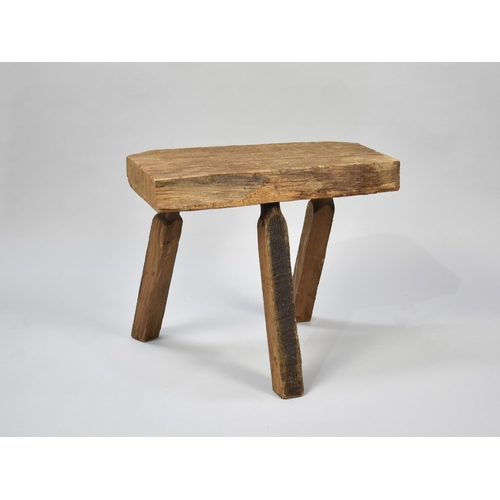 129 - A Vintage Rectangular Topped Three Legged Milking Stool, 43cms Wide