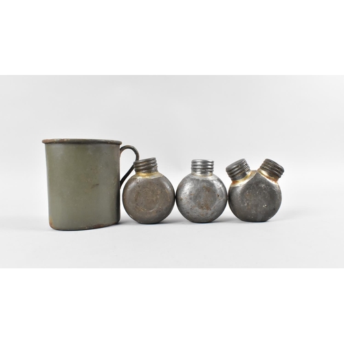 130 - Three Vintage German Metal Gun Oil Bottles together with an Enamelled Jug, 10cms High