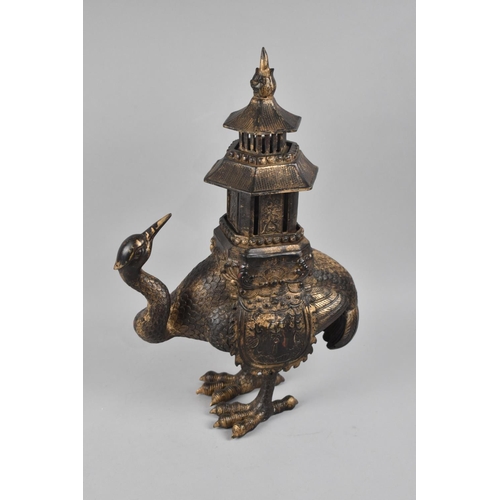 136 - A Large and Heavy Temple Censer in the Form of Peacock with Pagoda on Back, 48cms High