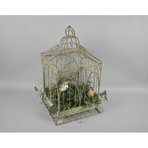 138 - A Modern Cold Painted Victorian Style Birdcage in Green Painted Metal, 46cms High