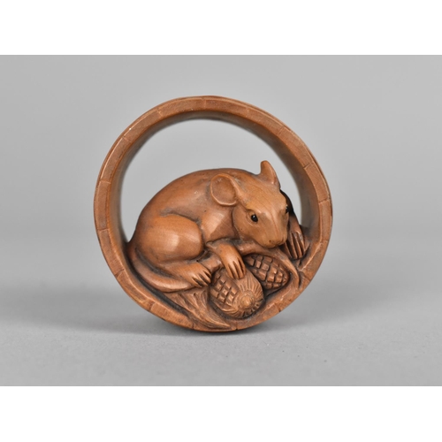 145 - A Carved Wooden Netsuke in the Form of Mouse with Corn in Barrel