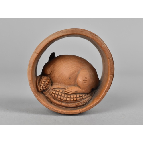 145 - A Carved Wooden Netsuke in the Form of Mouse with Corn in Barrel