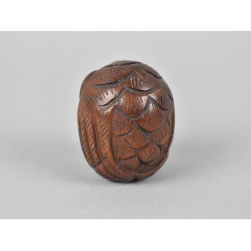 146 - A Carved Wooden Netsuke in the Form of an Owl