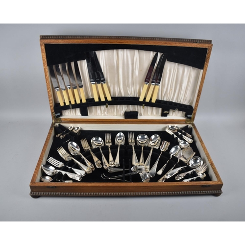 158 - A Large Mid 20th Century Oak Canteen of Silver Plated and Other Cutlery, not all Matching