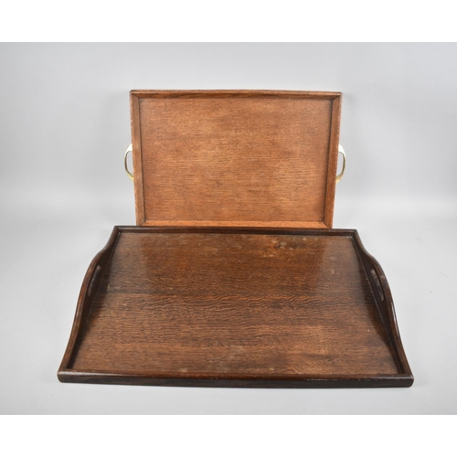 249 - A Large Two Handled Wooden Tray, 61cms by 46cms together with a Smaller Oak Example and Two Brass Ha... 