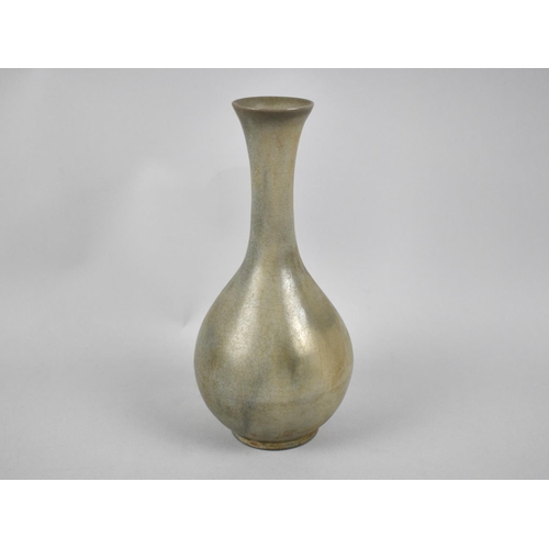 275 - A Reproduction Chinese Celadon Glazed Bottle Vase, 21.5cm high