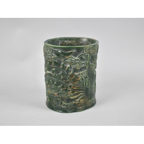 276 - A Chinese Reproduction Jade Style Brush Pot Decorated in Relief with Phoenix and Dragon in Scrolled ... 