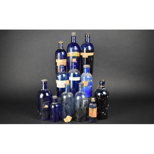 301 - A Collection of Twelve Victorian and Edwardian Glass Chemist's or Apothecary Bottles, Tallest 25cm a... 