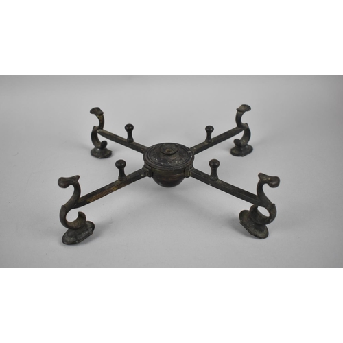 32 - An Early Patinated Bronze Burner Stand with Hinged Scrolled Supports, 27cms Diameter