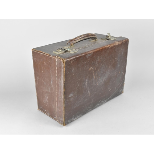 325 - A Mid 20th Century Leather Surgeon's or Doctor's Field Case, the Hinged Lid Revealing Three Drawers ... 