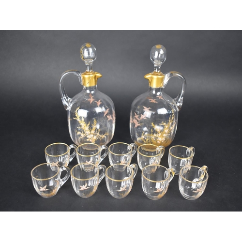 338 - An Early 20th Century Nice Quality Hand Painted Glass Tot Set to Comprise Ten Glasses and Two Decant... 