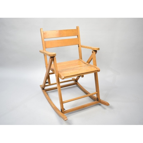 533 - A Mid 20th Century Hinged Child's Rocking Chair