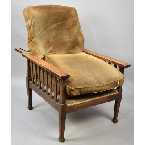 550 - An Edwardian Oak Framed Reclining Arm Chair