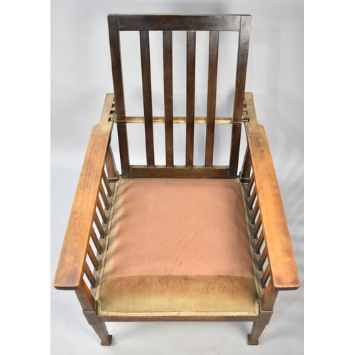 550 - An Edwardian Oak Framed Reclining Arm Chair