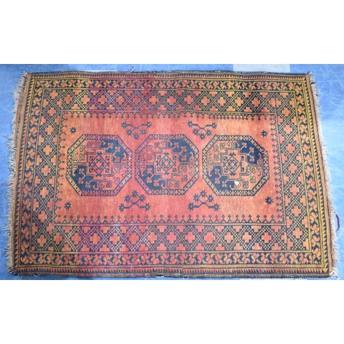 555 - Two Matching Patterned Rugs on Blue Ground, the Larger 220x113cm and Smaller 150x102cm