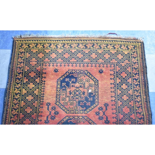 555 - Two Matching Patterned Rugs on Blue Ground, the Larger 220x113cm and Smaller 150x102cm