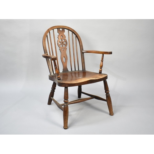 558 - A Cutdown Wheel Back Windsor Armchair