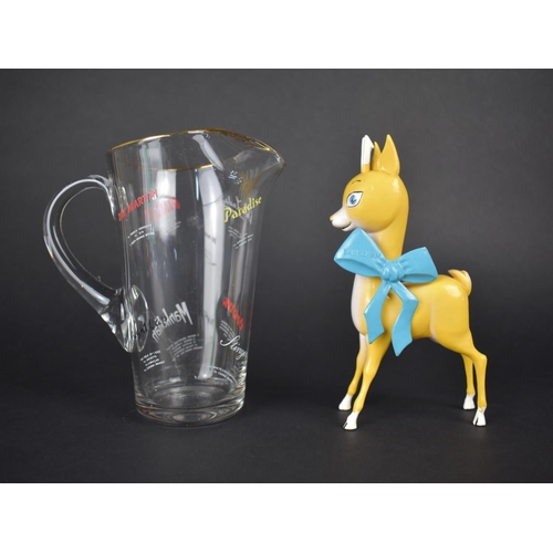 62 - A 1950s/60s Cocktail Mixing Jug with Printed Recipes together with a Tall Babycham Figure, 19cms Hig... 