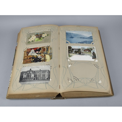 65 - A Large Late Victorian German Postcard Album, The Early Pages Dated from 1899 and Later Cuttings May... 