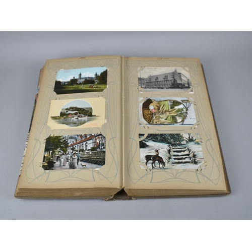 65 - A Large Late Victorian German Postcard Album, The Early Pages Dated from 1899 and Later Cuttings May... 