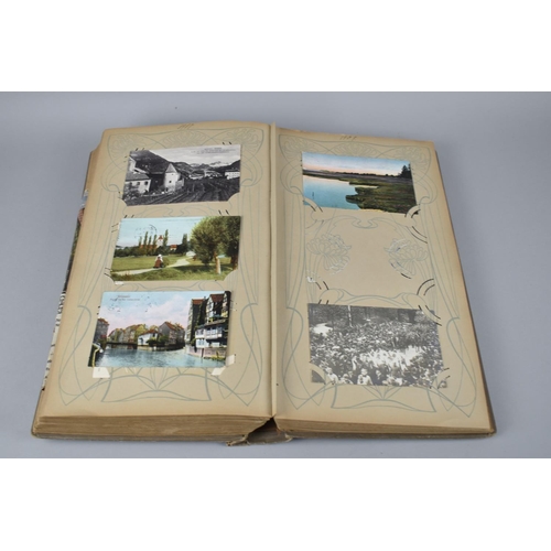 65 - A Large Late Victorian German Postcard Album, The Early Pages Dated from 1899 and Later Cuttings May... 