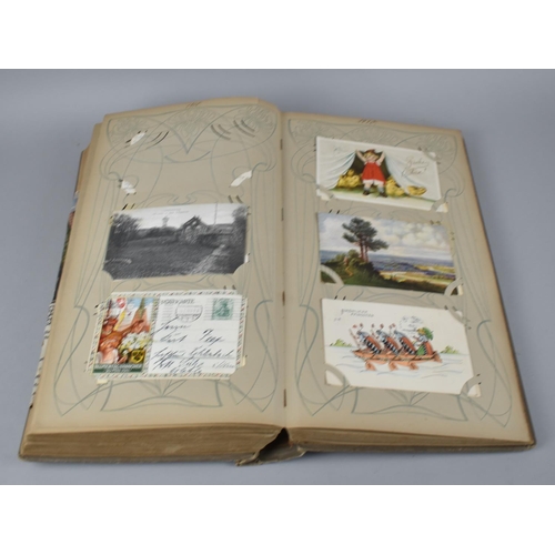 65 - A Large Late Victorian German Postcard Album, The Early Pages Dated from 1899 and Later Cuttings May... 