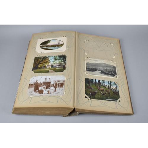 65 - A Large Late Victorian German Postcard Album, The Early Pages Dated from 1899 and Later Cuttings May... 