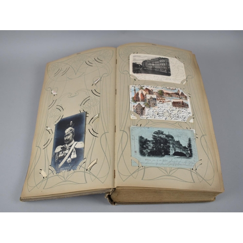 65 - A Large Late Victorian German Postcard Album, The Early Pages Dated from 1899 and Later Cuttings May... 