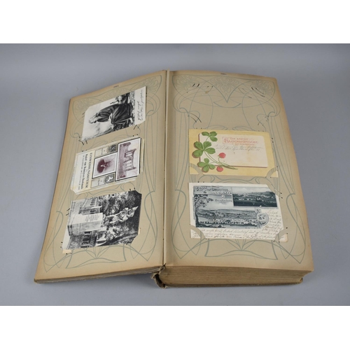 65 - A Large Late Victorian German Postcard Album, The Early Pages Dated from 1899 and Later Cuttings May... 