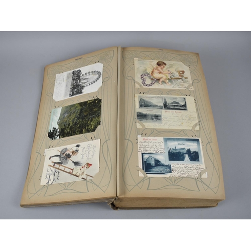 65 - A Large Late Victorian German Postcard Album, The Early Pages Dated from 1899 and Later Cuttings May... 