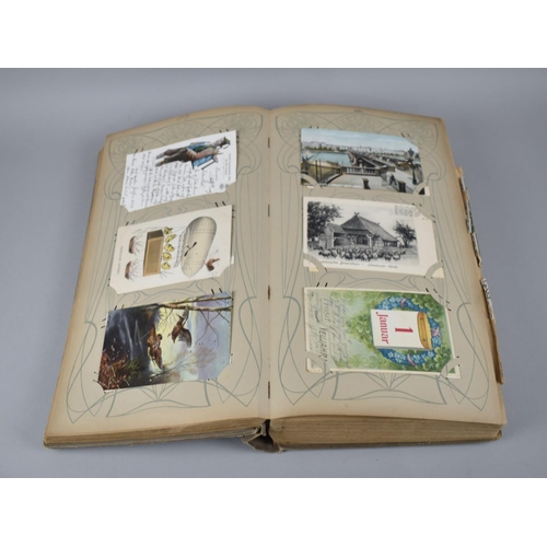 65 - A Large Late Victorian German Postcard Album, The Early Pages Dated from 1899 and Later Cuttings May... 